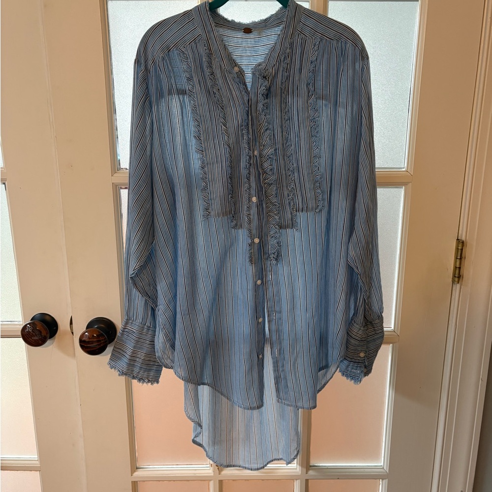 Free people one Blue Striped Button-Up Blouse with raw edge tuxedo details.